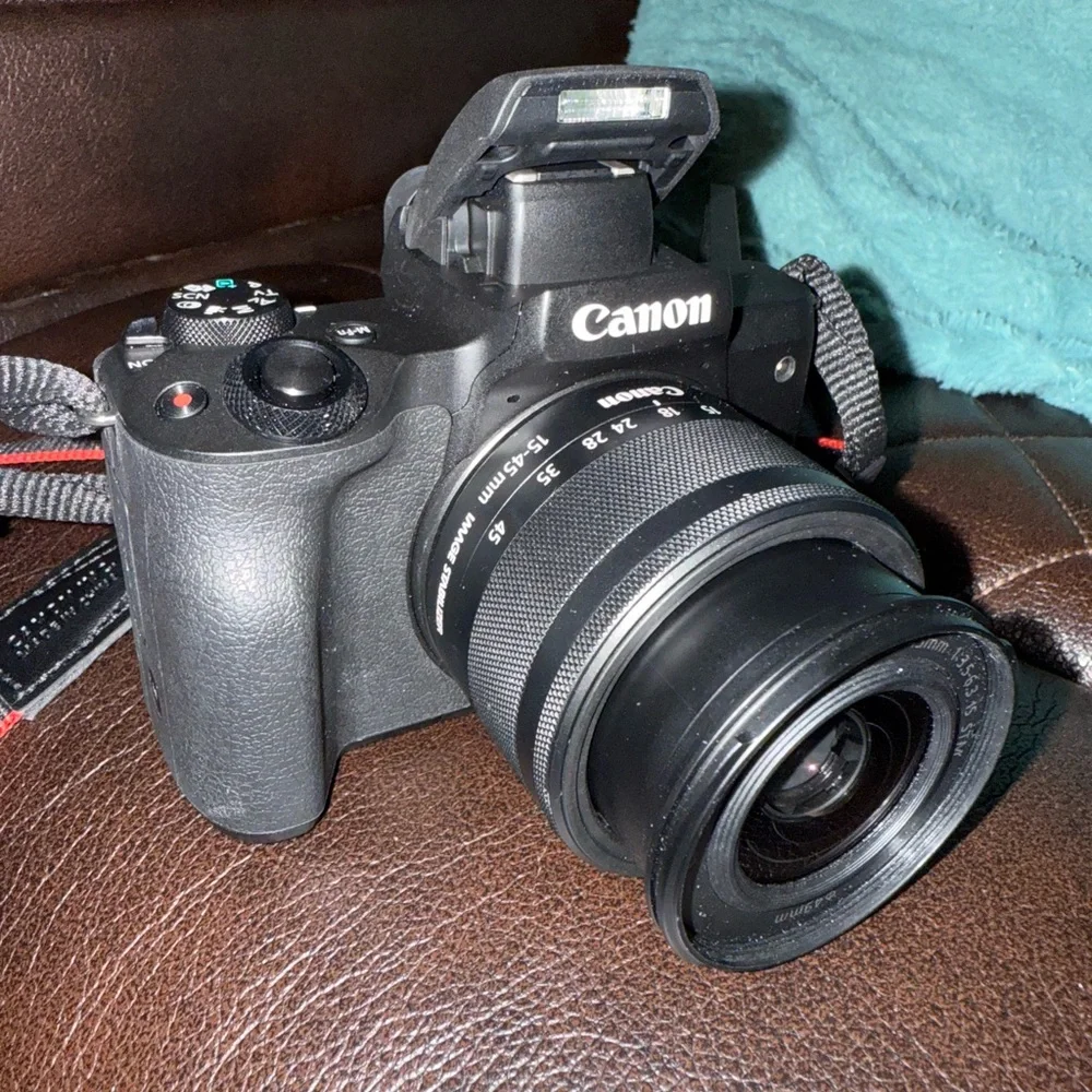 Canon Black DSLR Camera with Strap